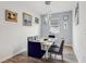 Bright dining room with table, chairs, and artwork at 537 Narrow View Ln, Groveland, FL 34736