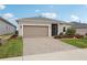 One-story house with a two-car garage at 537 Narrow View Ln, Groveland, FL 34736