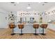 Modern kitchen with granite island and breakfast bar at 537 Narrow View Ln, Groveland, FL 34736