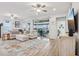 Open living area with sliding doors to lanai at 537 Narrow View Ln, Groveland, FL 34736