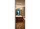 Clean bathroom features a large mirror, vanity, and a toilet at 702 S Grand Hwy, Clermont, FL 34711