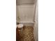 Well-maintained bathroom with a tiled shower-tub combination and storage under the vanity at 702 S Grand Hwy, Clermont, FL 34711