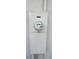 Image of the electric meter on the outside of the house at 702 S Grand Hwy, Clermont, FL 34711