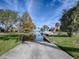 Community boat ramp that provides easy access to the waterway for residents at 102 Cedar Way, Yalaha, FL 34797