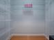 Spacious walk-in closet equipped with metal shelving at 102 Cedar Way, Yalaha, FL 34797