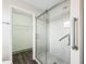 Updated bathroom featuring walk-in shower, safety bars and easy access to walk-in closet at 11584 Se 175Th St, Summerfield, FL 34491