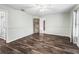 Spacious bedroom with hardwood floors and ample natural light at 11584 Se 175Th St, Summerfield, FL 34491