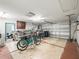 Spacious garage featuring parking for multiple vehicles, laundry area and a boat at 11584 Se 175Th St, Summerfield, FL 34491