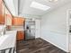 Open kitchen offers stainless steel appliances and hardwood flooring at 11584 Se 175Th St, Summerfield, FL 34491