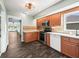Modern kitchen features stainless steel appliances, a window view, and laminate flooring at 11584 Se 175Th St, Summerfield, FL 34491