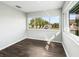 This office space features expansive windows and laminate flooring at 11584 Se 175Th St, Summerfield, FL 34491