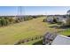 Beautiful backyard featuring a fence separating the property from green space at 1639 Campos Dr, The Villages, FL 32162