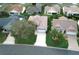Community overview showing a single-Gathering home with a spacious yard at 1897 Caryle Ln, The Villages, FL 32162