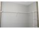 Walk-in closet with plenty of shelving for optimal storage solutions at 1897 Caryle Ln, The Villages, FL 32162