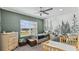 Cozy bedroom with mountain mural, twin beds, and plenty of storage at 2197 Pearl Cider St, Orlando, FL 32824