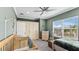 Bright bedroom with large window, built-in closet, and crib at 2197 Pearl Cider St, Orlando, FL 32824