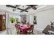 Formal dining room with a chandelier and large windows at 2197 Pearl Cider St, Orlando, FL 32824