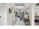 Bright and spacious entryway with a staircase and views into the living room at 2197 Pearl Cider St, Orlando, FL 32824