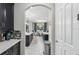 Open kitchen with views into dining area and hardwood floors at 2197 Pearl Cider St, Orlando, FL 32824