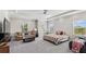 Spacious main bedroom with sitting area and large windows at 2197 Pearl Cider St, Orlando, FL 32824