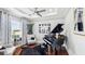 Relaxing music room featuring a grand piano and comfortable seating at 2197 Pearl Cider St, Orlando, FL 32824