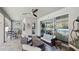 Outdoor patio with seating area and access to the pool at 2197 Pearl Cider St, Orlando, FL 32824