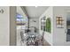 Covered patio with outdoor kitchen and dining area at 2197 Pearl Cider St, Orlando, FL 32824
