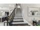 Impressive wooden staircase with metal railings at 2197 Pearl Cider St, Orlando, FL 32824