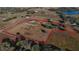 Expansive aerial view showcases the property's boundaries, house, ponds, and surrounding landscape at 2437 Bay Lake Loop, Groveland, FL 34736