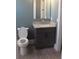 Bathroom with granite countertops and a toilet at 2437 Bay Lake Loop, Groveland, FL 34736