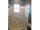Bathroom with a glass shower and a toilet at 2437 Bay Lake Loop, Groveland, FL 34736