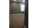 Bedroom with a ceiling fan and a window with white shutters at 2437 Bay Lake Loop, Groveland, FL 34736