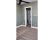 Cozy bedroom with plush carpet and a closet providing ample storage space at 2437 Bay Lake Loop, Groveland, FL 34736