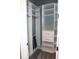 Walk-in closet with custom shelving and drawers for organized storage and functionality at 2437 Bay Lake Loop, Groveland, FL 34736
