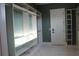 Spacious walk-in closet with custom shelving and ample storage space, featuring stylish white marble floors at 2437 Bay Lake Loop, Groveland, FL 34736