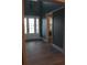 Welcoming entryway featuring tiled floors and a modern white door, offering a glimpse of the outdoors at 2437 Bay Lake Loop, Groveland, FL 34736