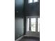 Inviting foyer with a tall ceiling and a grand entrance, filled with abundant light at 2437 Bay Lake Loop, Groveland, FL 34736