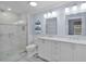 Elegant bathroom with double vanity and walk-in shower at 3152 Willow Brook Ln, The Villages, FL 32162