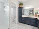 Bathroom with a single vanity, shower, and plenty of storage at 3606 Adamsville Ave, The Villages, FL 32163