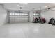 Spacious garage with epoxy floor and ample storage at 3606 Adamsville Ave, The Villages, FL 32163
