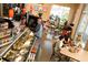 Bright and airy coffee shop with seating and pastry display at 8850 Sw 97Th St # E, Ocala, FL 34481