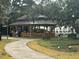 Picturesque gazebo overlooking the waterfront in a lush park setting at 1001 Michelle Ct, Tavares, FL 32778