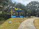 Vibrant playground with unique airplane features in a well maintained park at 1001 Michelle Ct, Tavares, FL 32778