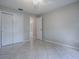 Spacious bedroom with tile flooring, closet, and natural light at 1320 Arredondo Dr, The Villages, FL 32162