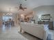 Open living space with seamless flow between living room, dining area, and kitchen at 1320 Arredondo Dr, The Villages, FL 32162