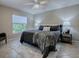 Comfortable main bedroom with soft textures and plenty of natural light at 1320 Arredondo Dr, The Villages, FL 32162