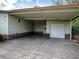 Attached carport with storage space at 1710 Hilton Head Blvd, The Villages, FL 32159