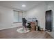 Bright home office with hardwood floors and built-in desk at 1710 Hilton Head Blvd, The Villages, FL 32159