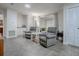 Open living space with cozy armchairs at 1710 Hilton Head Blvd, The Villages, FL 32159