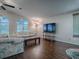 Spacious living room with large windows at 1710 Hilton Head Blvd, The Villages, FL 32159